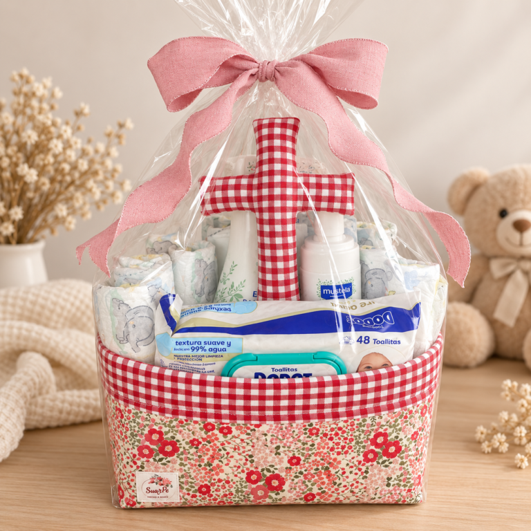 Cesta roja de pañales con 3 productos Mustela para bebé